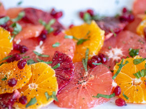 Sliced Strawberries, Citrus Fruits with Pomegranate seeds Salad.