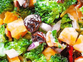 Broccoli salad with bacon, raisins, and cheddar cheese