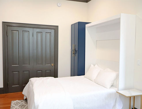 Apartment A guest murphy bed located in office