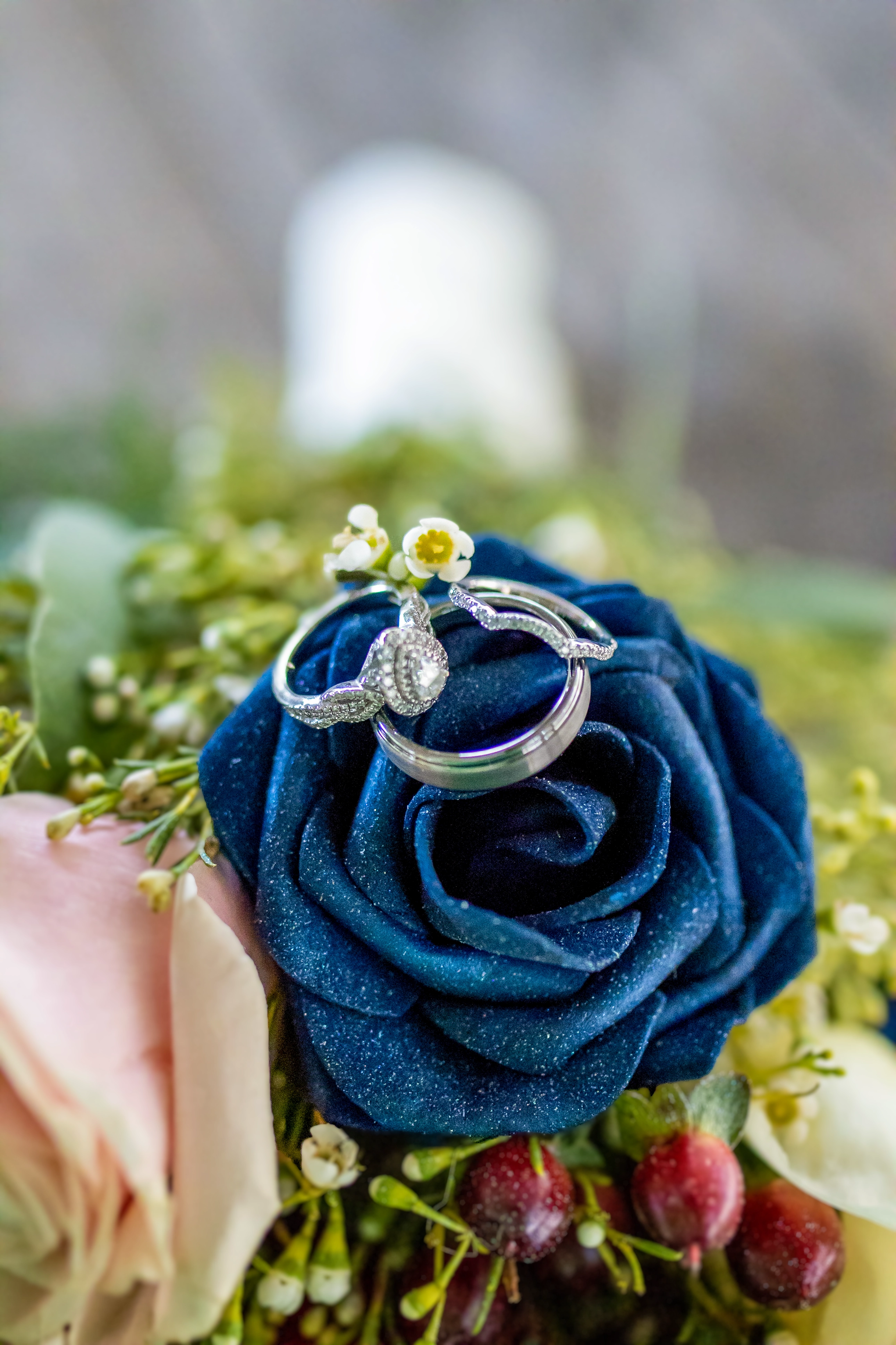 wedding rings and bouquet
