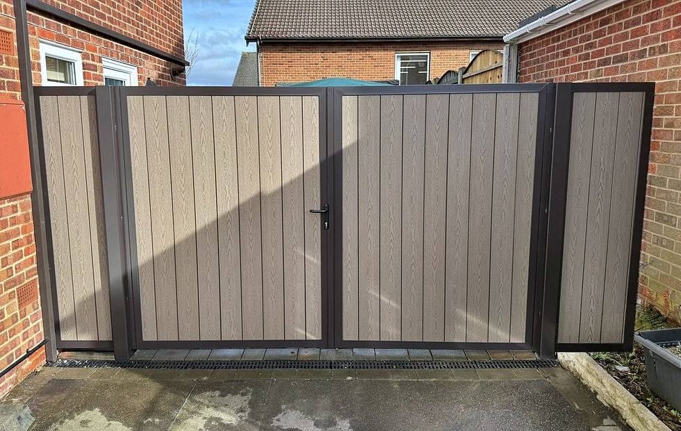 Steel-framed drive gates and side panels with brown composite panel inlays