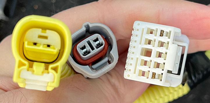 Common Toyota connectors found under the seat and part of the upgrade process
