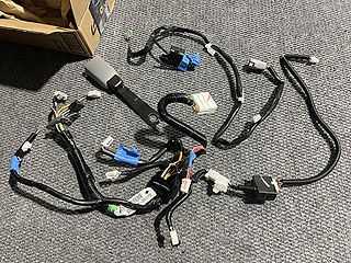 The entire underseat harness was removed and shipped to us