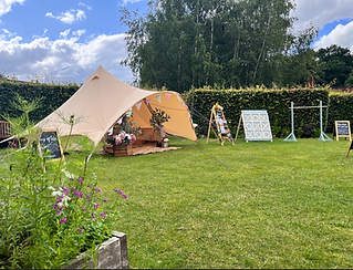 bell tent and lawn games walled garden new.png