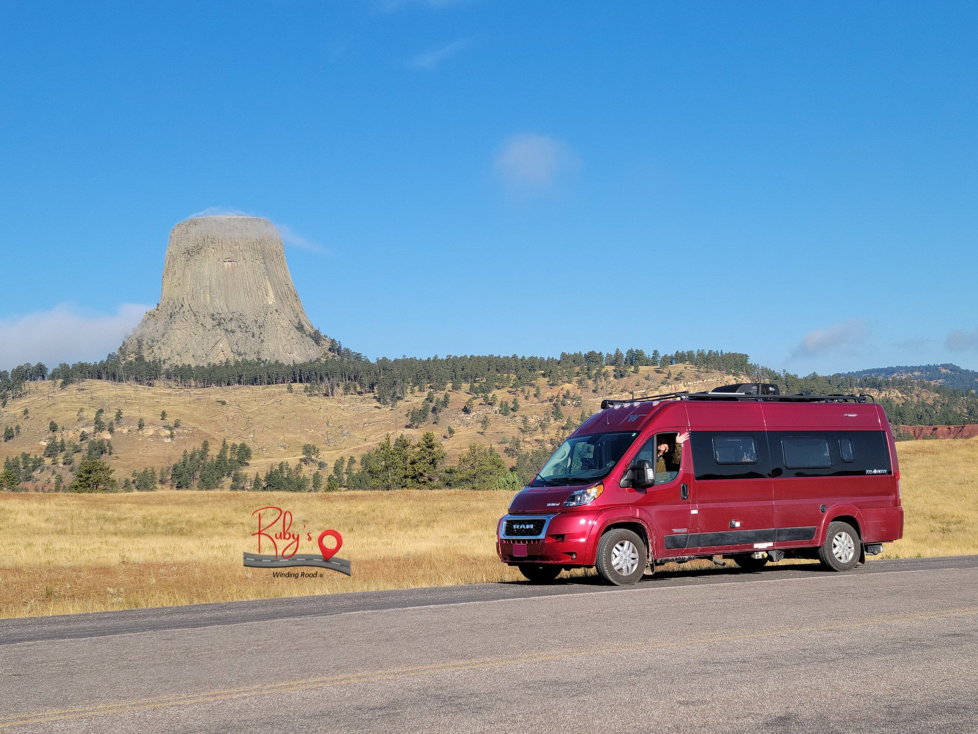Winnebago Travato with Devils Tower in background