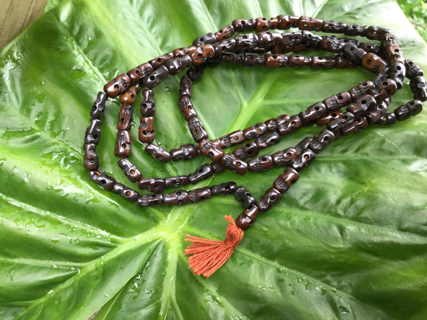 Buddhist mala in brown bone beads