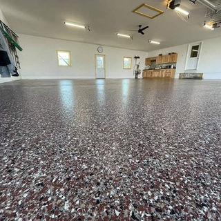 Glossy epoxy floor in a large open room