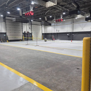 Large shop interior with a new epoxy floor