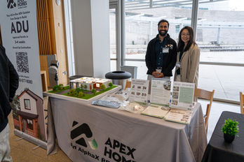 Small Builders Association event attendees networking and discussing industry topics