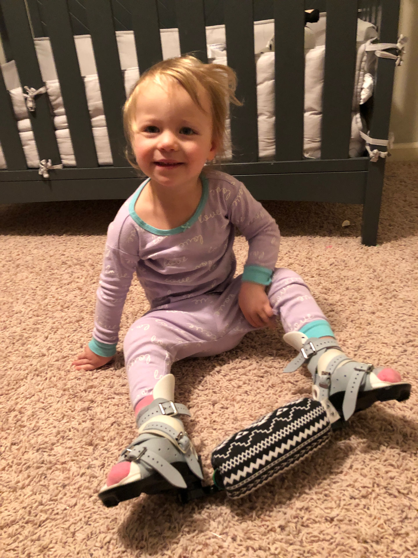 Baby A seen wearing boots and bar