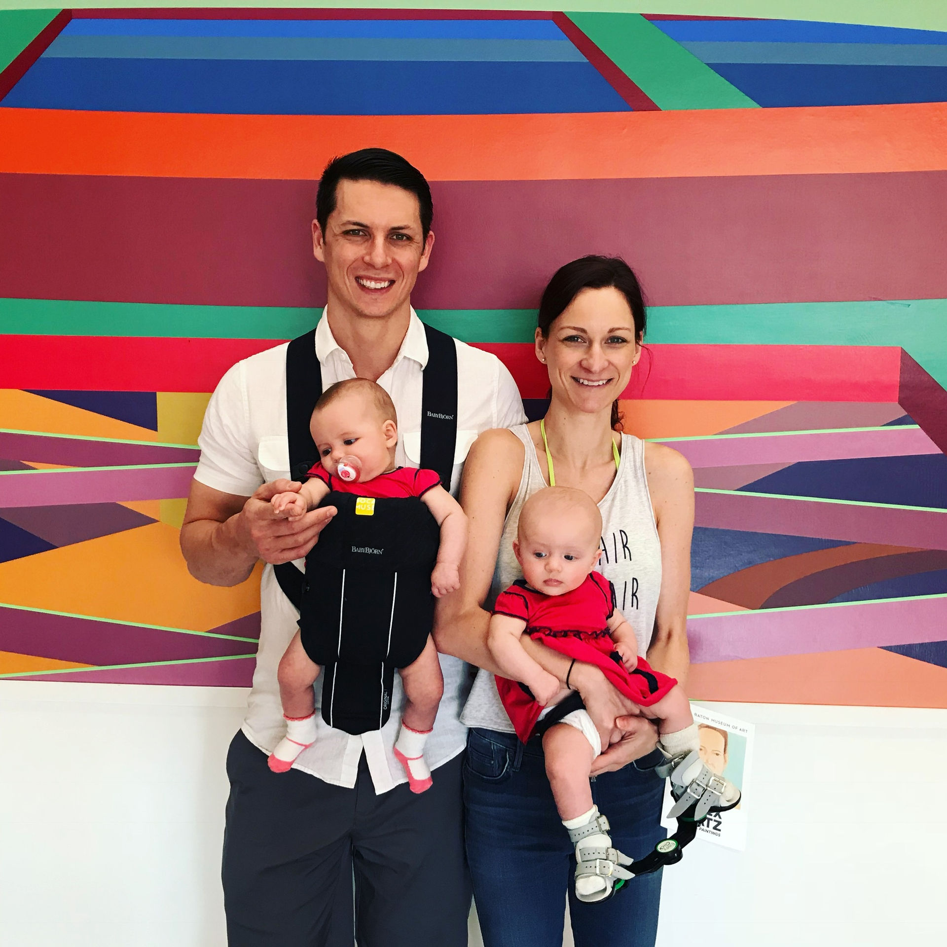 Author Lindsay Loring and her family on a vacation - Baby A wearing a leg brace