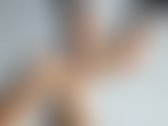 two sets of hands holding coffee on a table