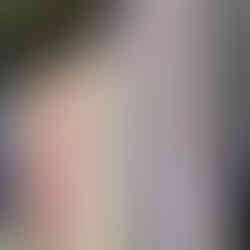 a right slanting photo of a bookshelf 