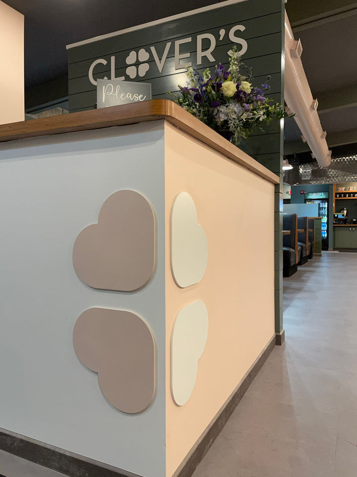 Modern diner spatial and logo design for CLOVER'S in Skaneateles, NY.