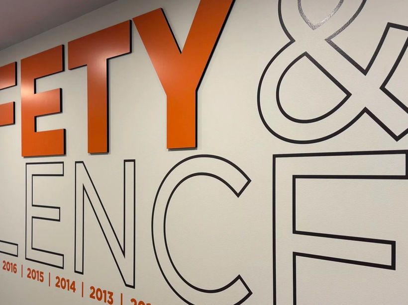 Collaborative workspace and conference room branding and environmental graphics for The Hub at Hueber Breuer headquarters in Syracuse, NY.