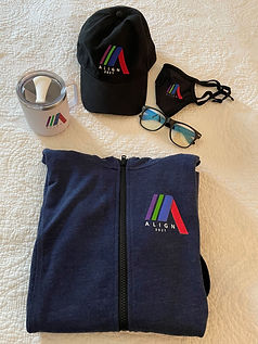 A mug, hat, mask, blue light glasses, and a hoodie, all branded with ALIGN