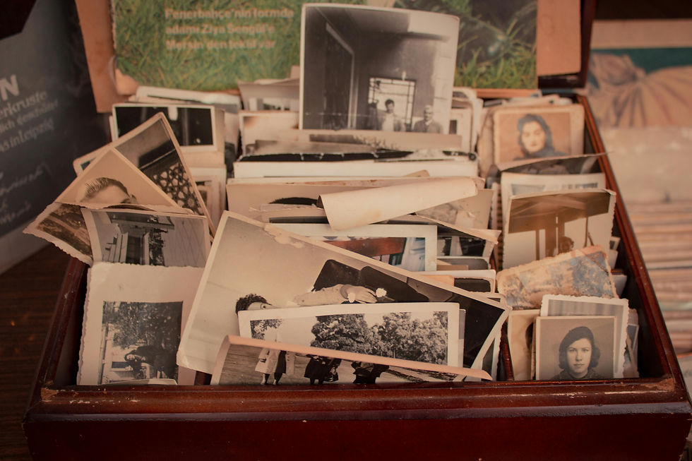 Close-up view of an antique heirloom box filled with family keepsakes
