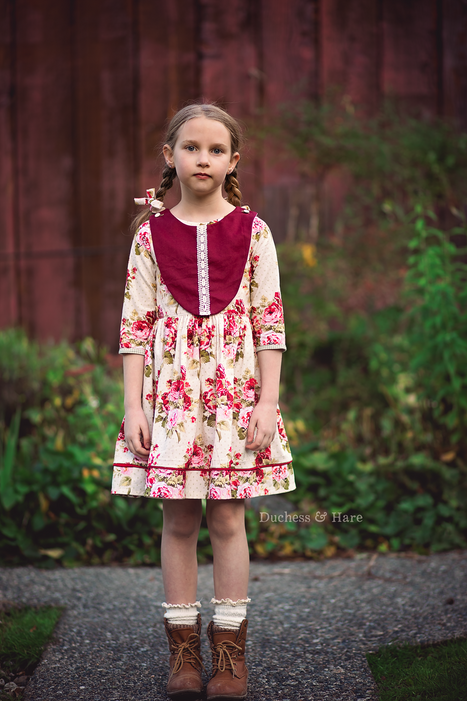 Every Which Way floral dress with button on curved plastron 