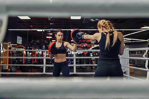 two-women-boxing-on-the-ring-box-workout-ZBDZE7W.jpg