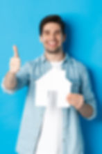 insurance-mortgage-real-estate-concept-satisfied-client-showing-house-model-thumb-up-smili