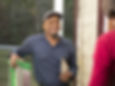 Photo of a home energy professional talking to a homeowner.