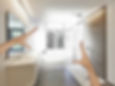 Photo of someone's hands framing up a modern bathroom design.