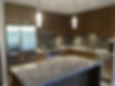 Photo of a new, modern kitchen.