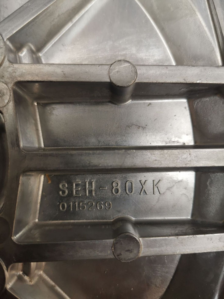 Close-up of Koshin 80mm flange bracket mounting holes and center bore for BFC-1 pump models