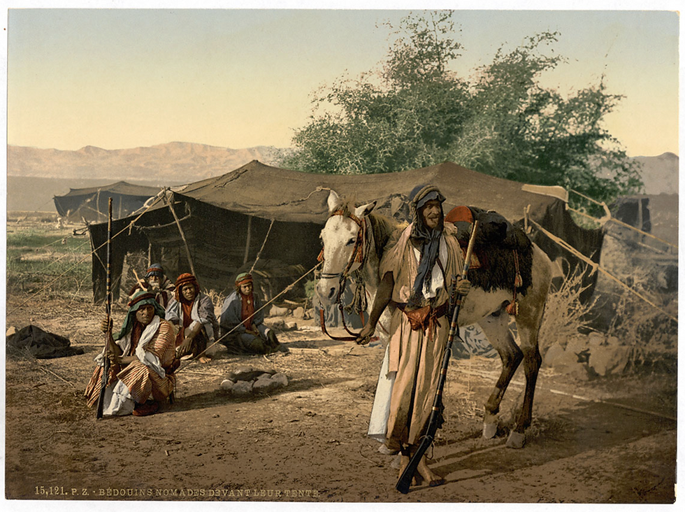 Colorized photo of Bedouins in front of their tent with horses in the Jordan valley