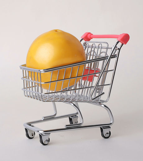 yellow-round-fruit-on-stainless-steel-sh