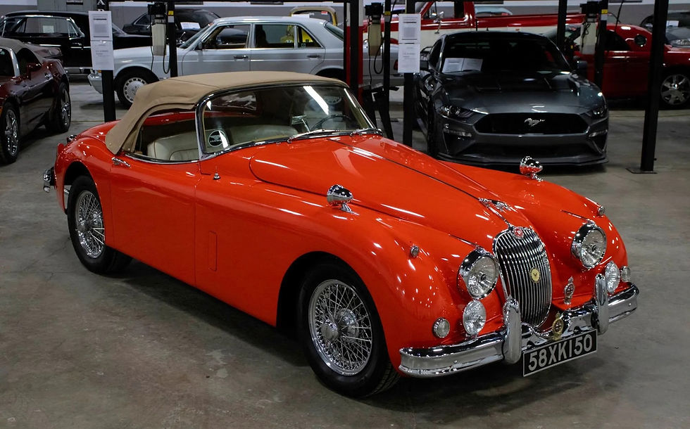 Red Jaguar XK150 for sale