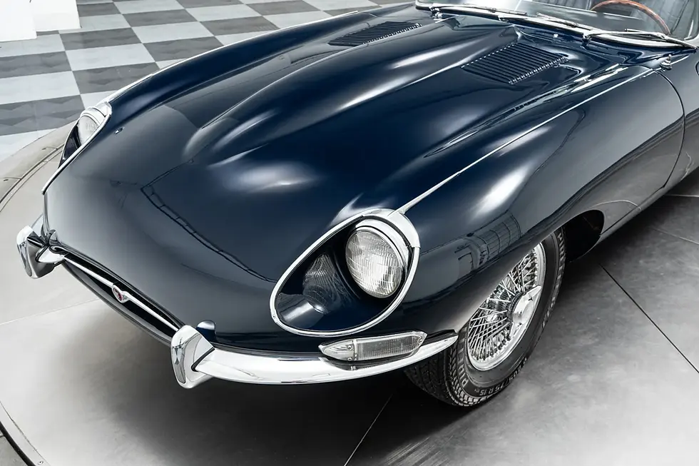A blue 1967 Jaguar E-Type for sale