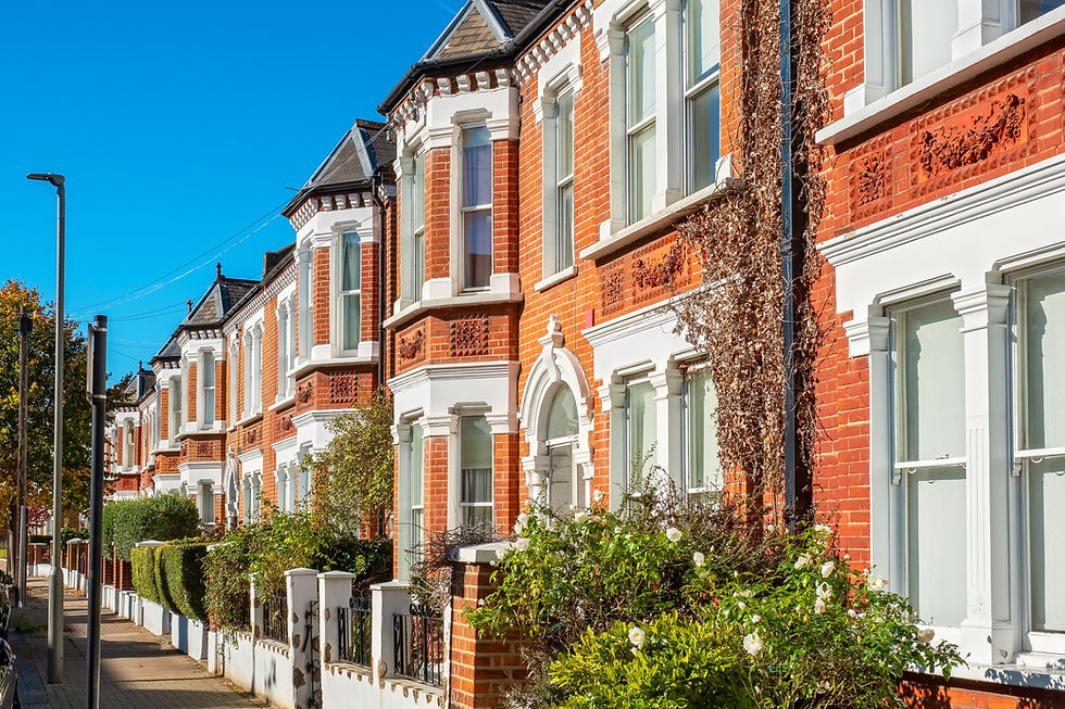 Traditional brick terraced houses in London. England.jpg