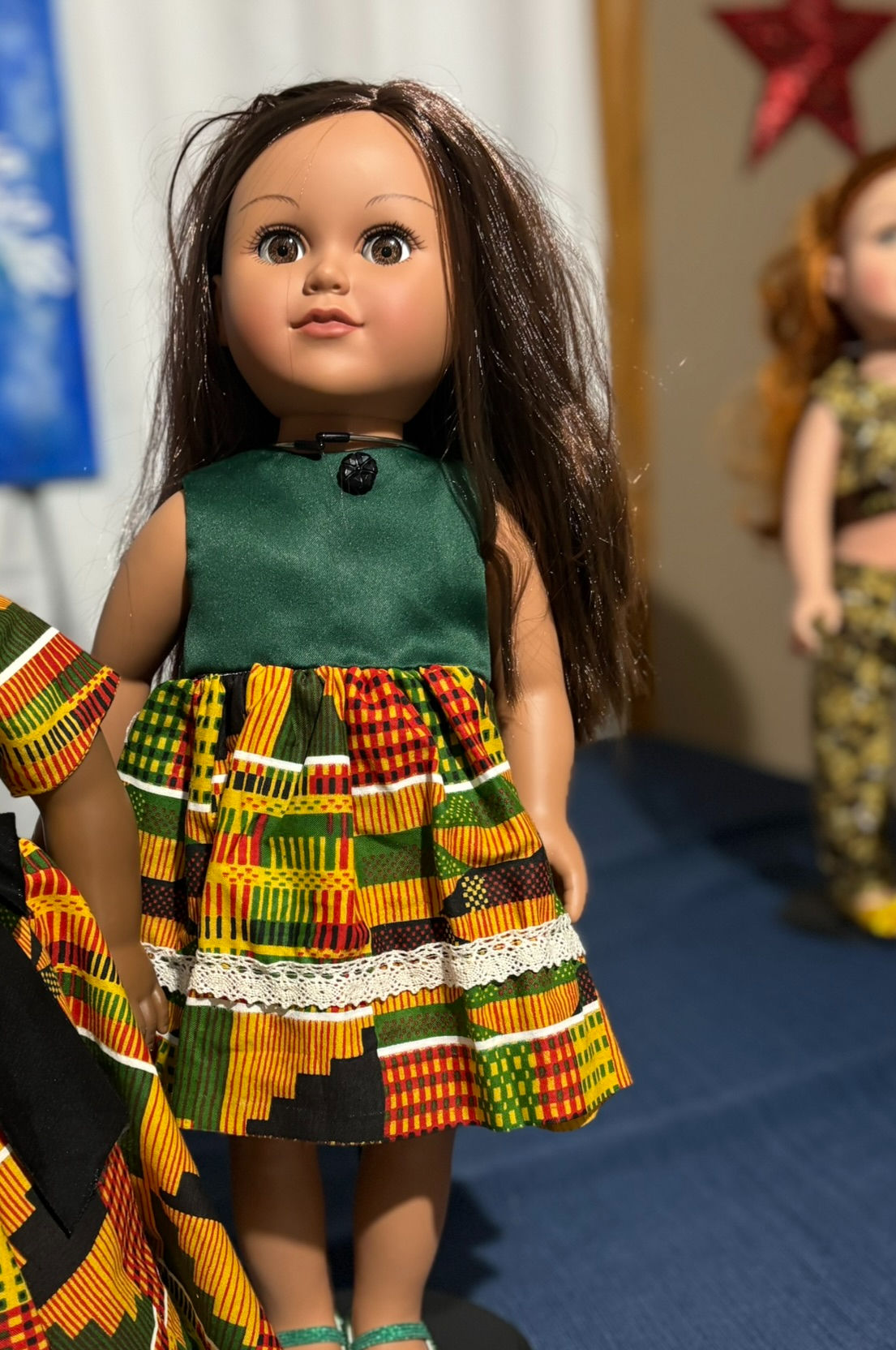 Green bodice with African print skirt