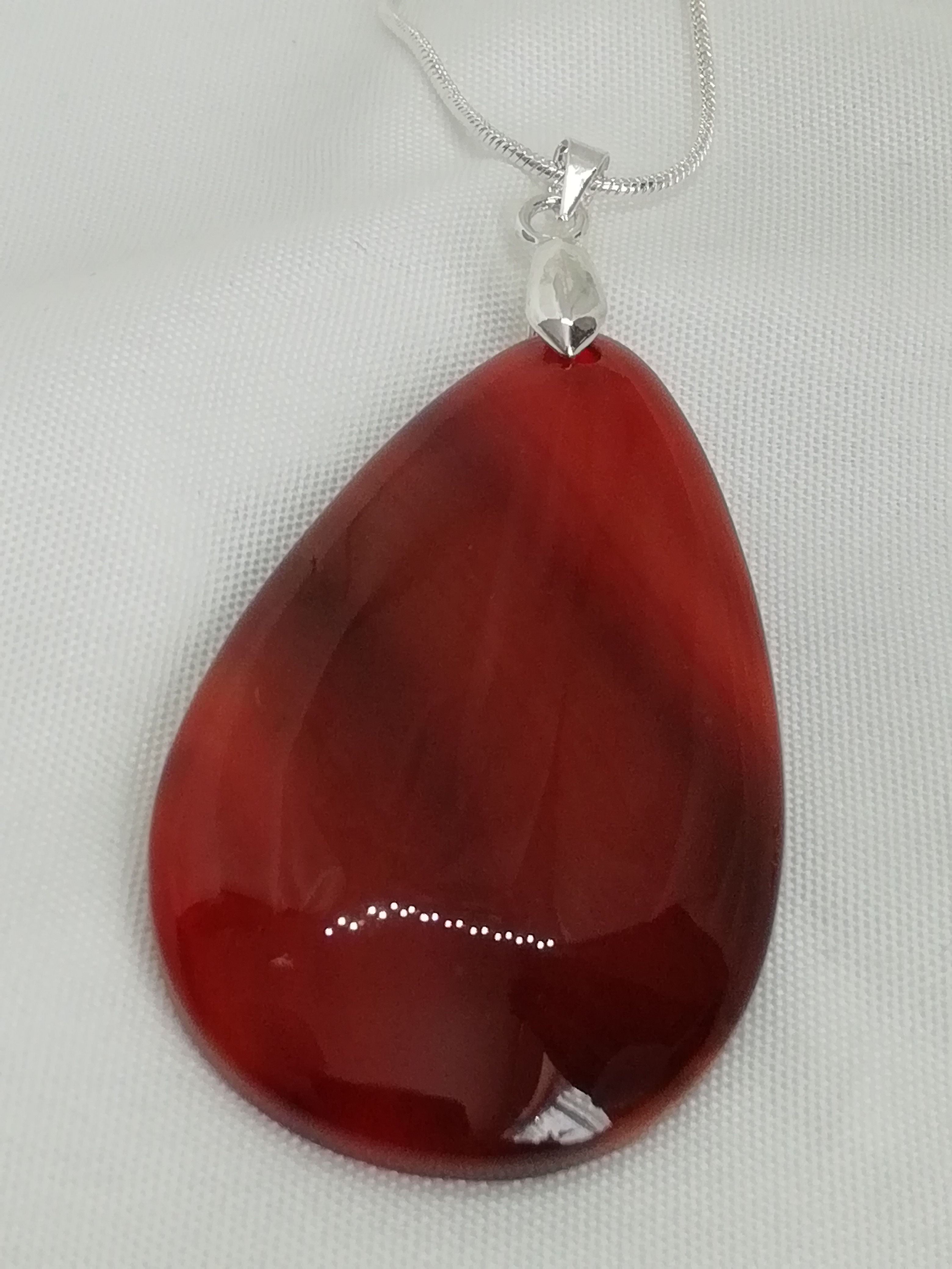 Handmade natural gemstone Carnelian pearshaped cabochon on sterling silver bale with a sterling pendant
