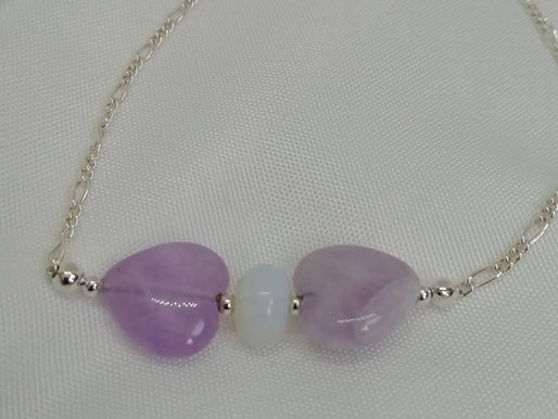 Handmade Amethyst hearts with an opaline bead spacer with silver rope chain bracelets