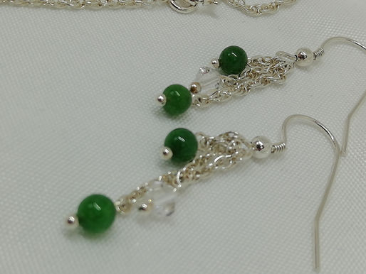 Handmade Green onyx beads with crystals on individual sterling silver earrings