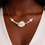 Miniature : COLLIER "PEARL ARCH WITH WHITE SHELL"