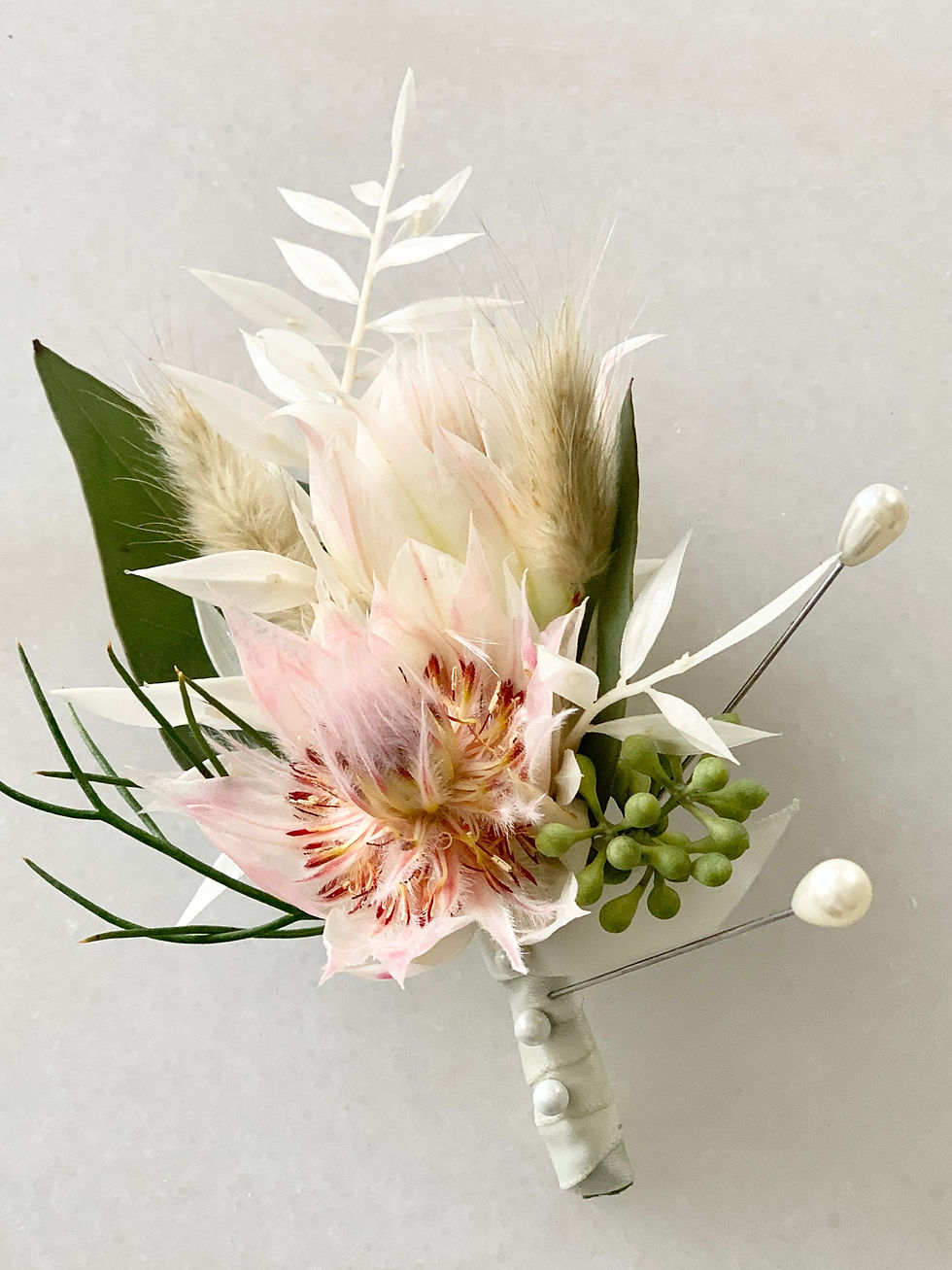 Blushing bride boutonniere