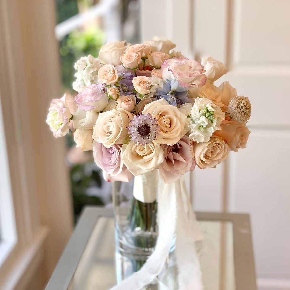 surf-and-sand-wedding-bride-bouquet-ocean-view