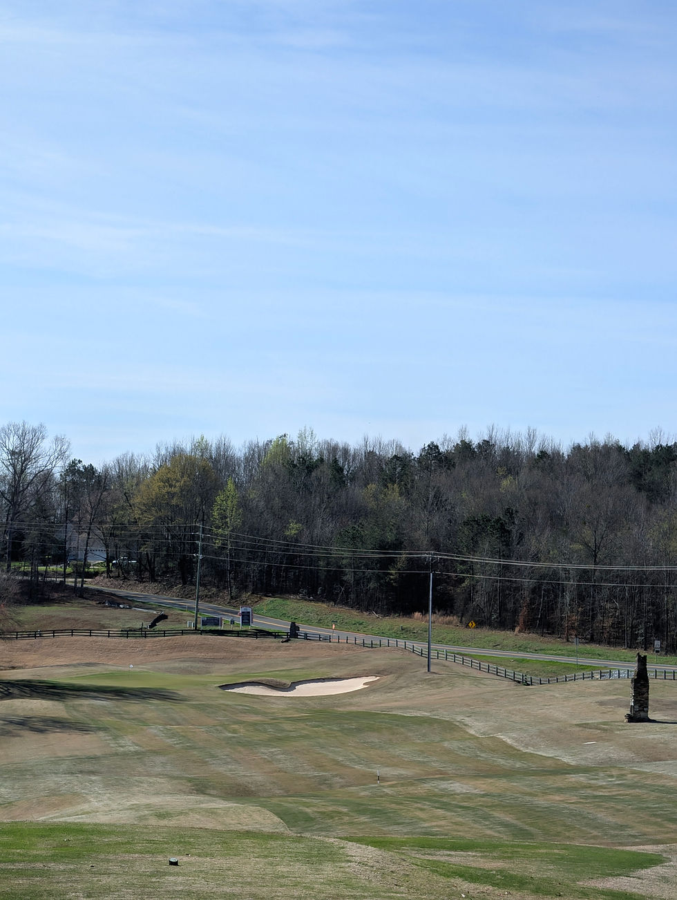 Hole 1 - Long par 4 with an elevated tee shot, up to an elevated green.
