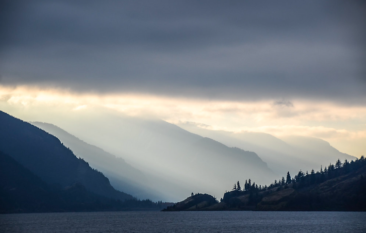 river with hills and clouds