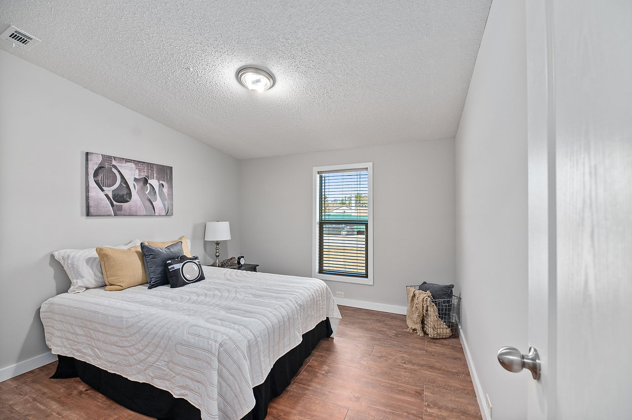 a bedroom with a window