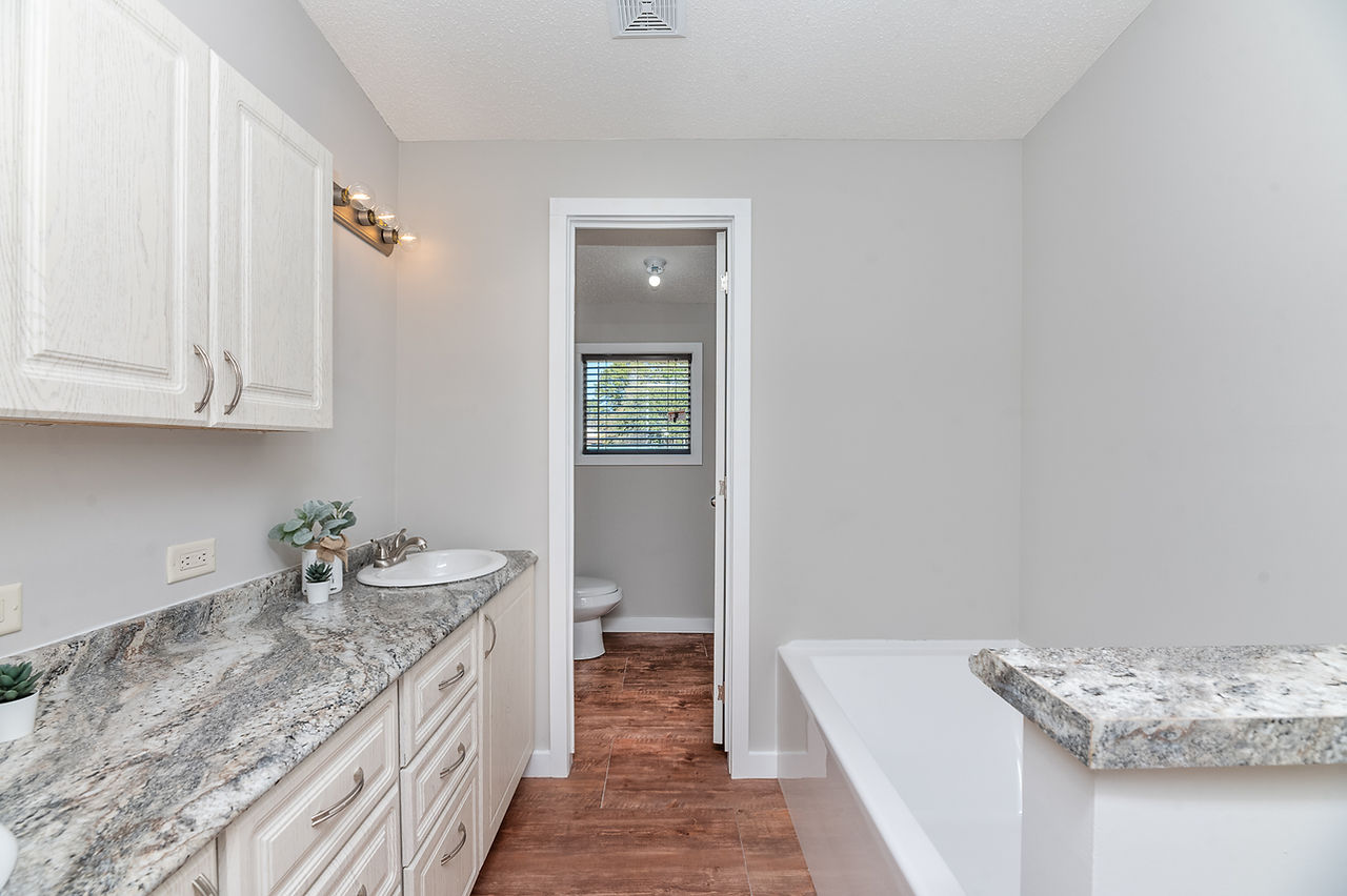 the primary bath also has a tub