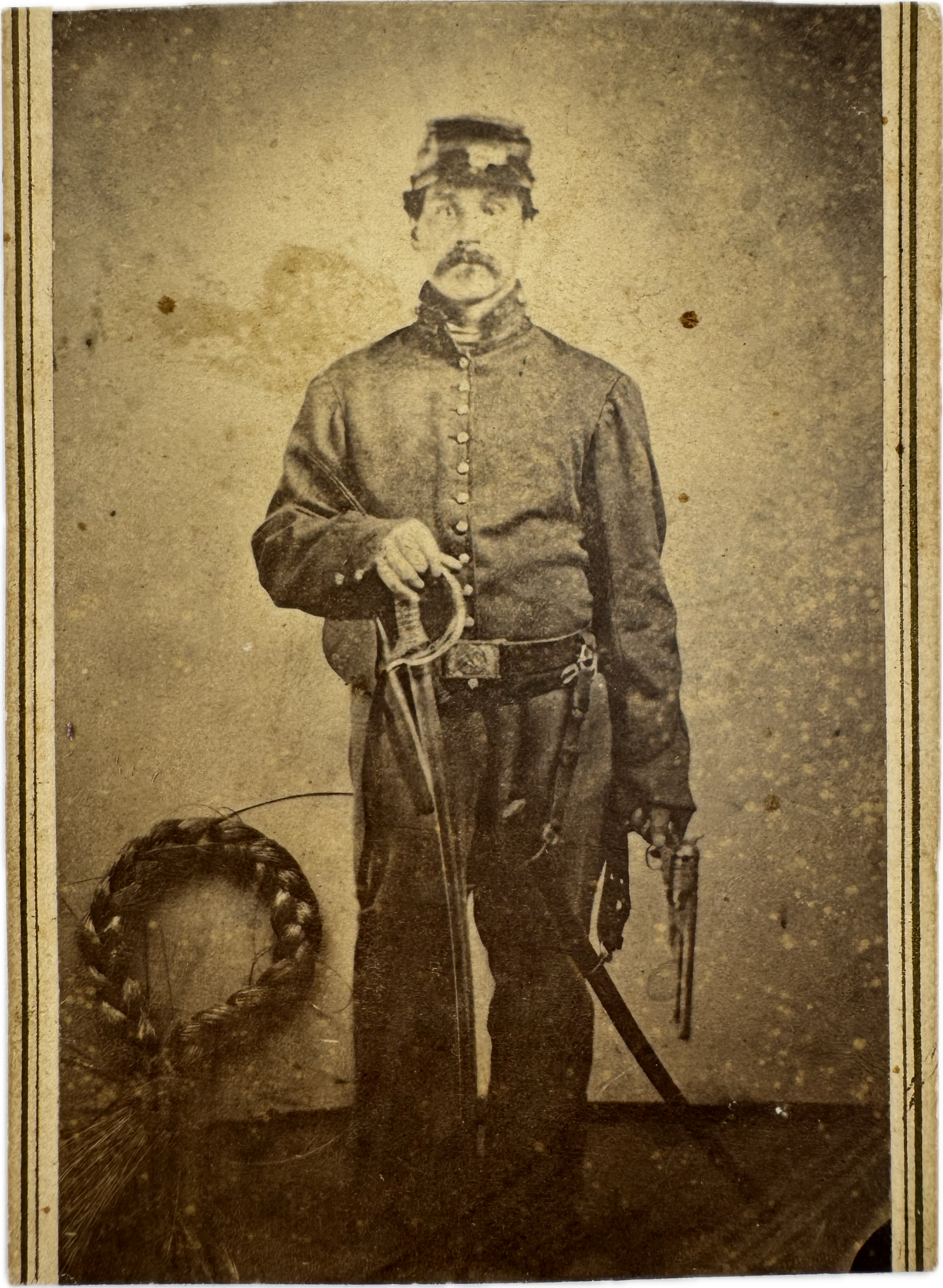 Trimmed CDV of Federal Soldier with Sword and Colt Army in Hand