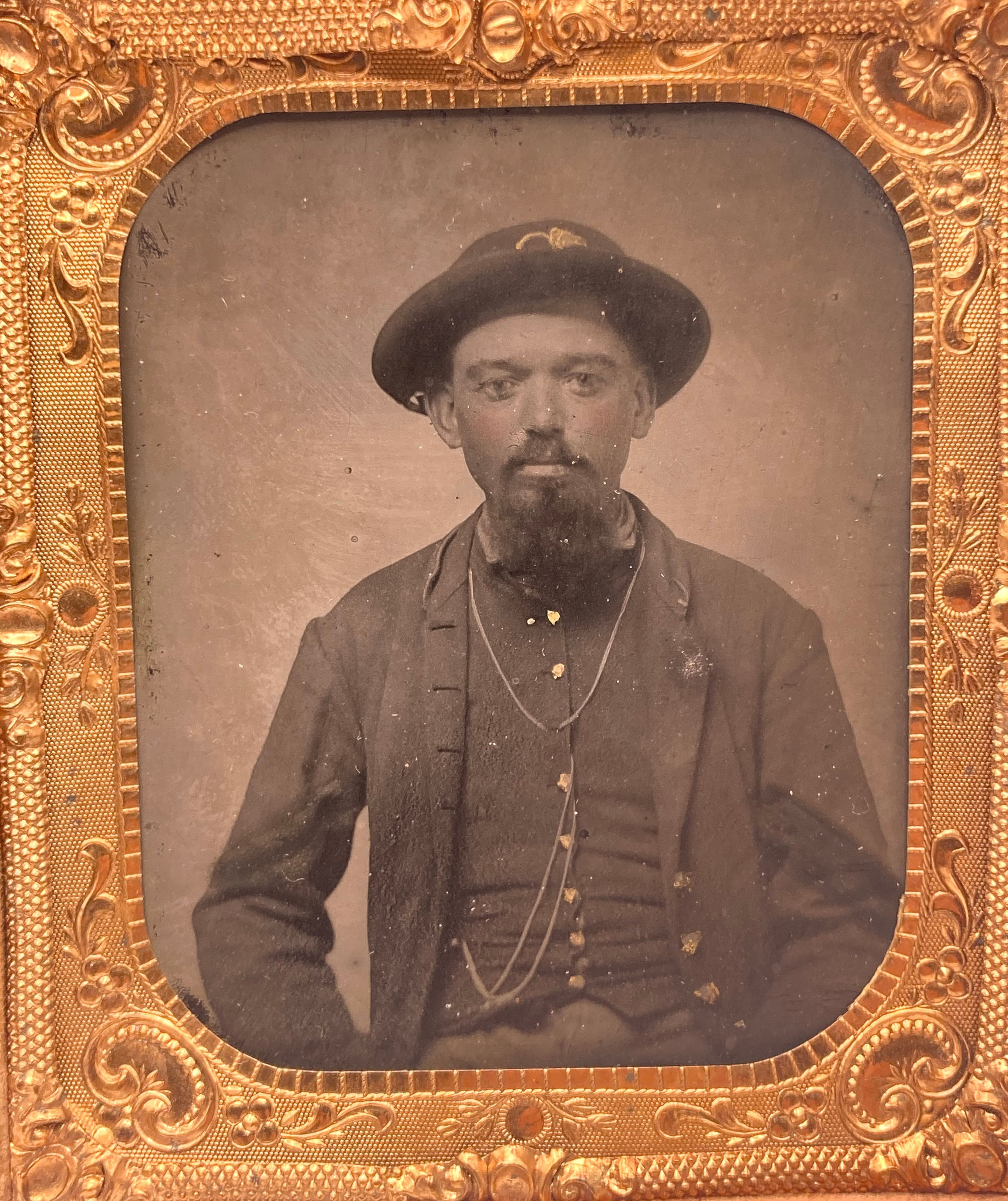 1/6th Plate Tintype of a Federal Soldier with a Locket of Hair Behind the image