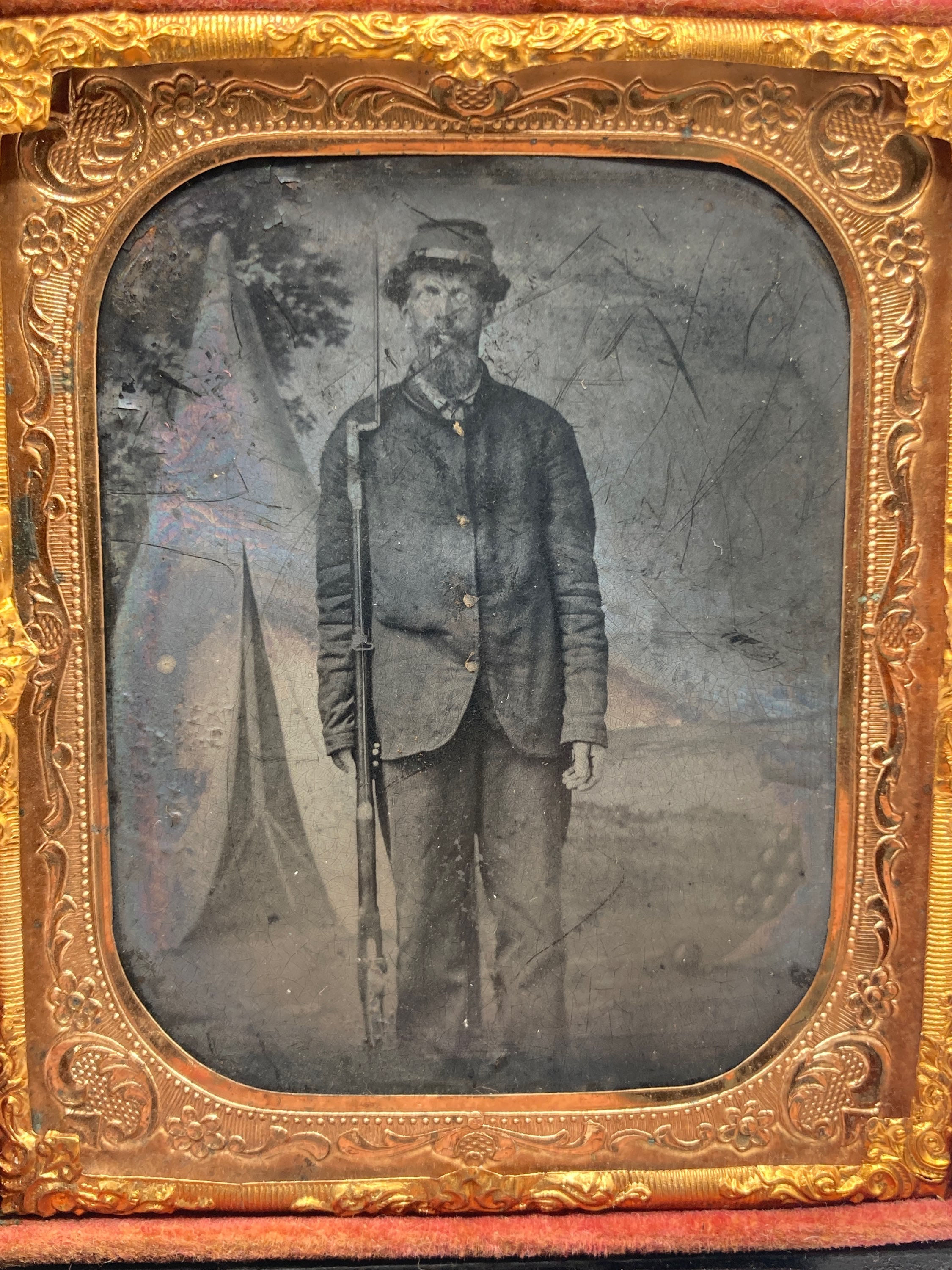 Armed 1/6th Plate tintype of Federal Soldier in Front of Camp Scene