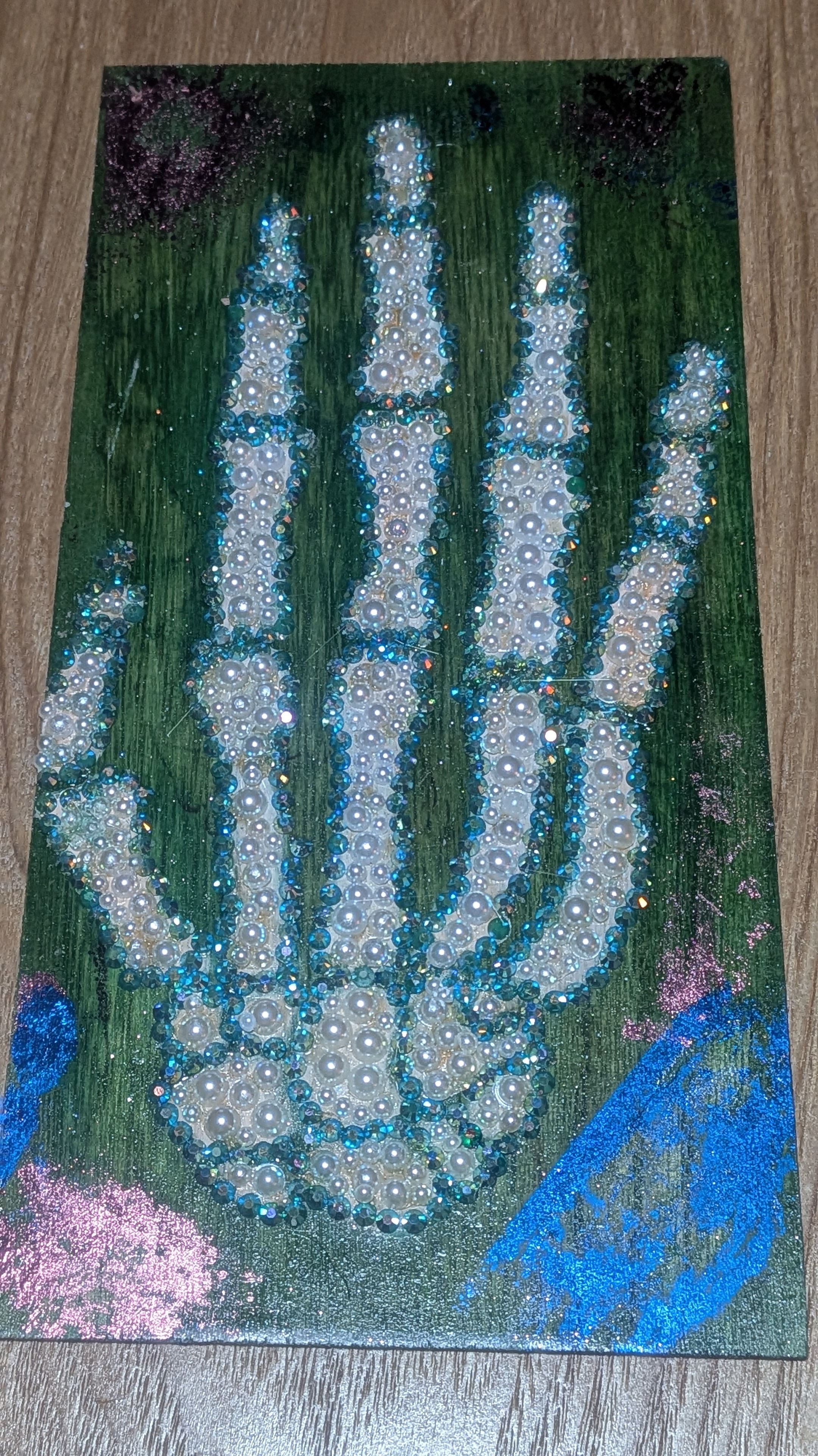 Gothic skeletal hand on wood