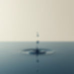 Water droplet creating ripples symbolizing long-term impact and meaningful results.