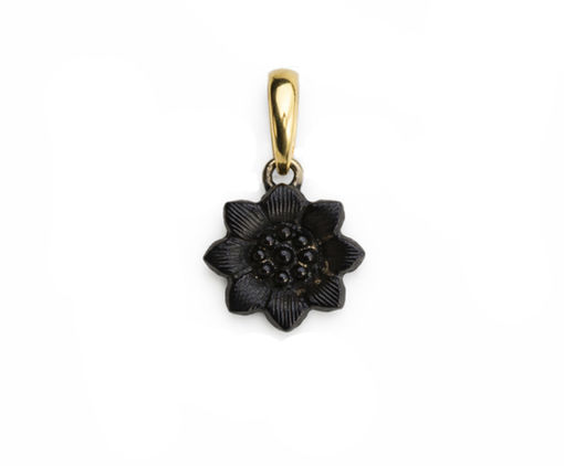 A black gemstone flower pendant